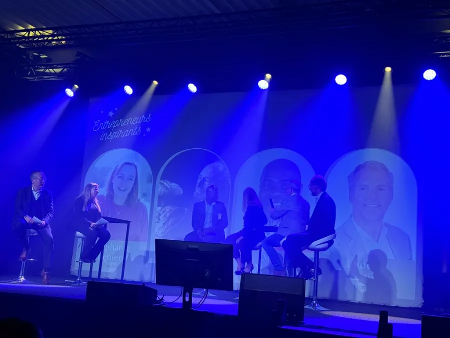 A conference on stage attended by Valorize Solutions to learn and exchange with other entrepreneurs.